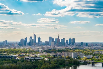 Foto op Plexiglas Skyscrapers in city center, Warsaw aerial landscape under blue sky © lukszczepanski