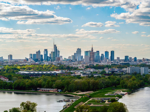Skyscrapers in city center, Warsaw aerial landscape under blue sky