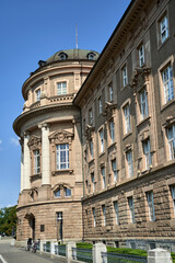 The facade of a neo-baroque, historic building with columns in the city of Poznan