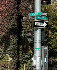 street sign at intersection of seneca and aurora street (ithaca, new york state) one way sign, road...