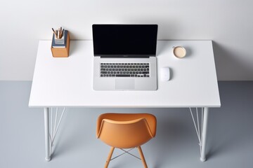 Fototapeta premium Workplace at home, light table with laptop, mouse, cup and chair. Writing utensils. Top view. Generated by artificial intelligence