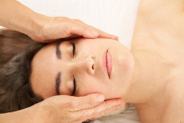 Fototapeta na wymiar woman receiving a facial massage