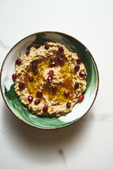 Baba ganoush. A smoky Middle Eastern dip made from roasted eggplants, blended with tahini, lemon juice with garlic and olive oil. often garnished with parsley and served with pita bread.