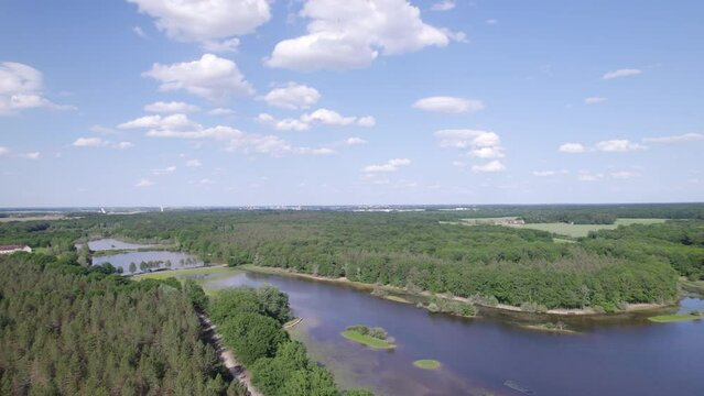 Drone Rotation view on the forest around the Pond of Gerbe close to Chateauroux city in Indre