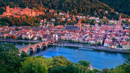 Heidelberg, Germany. Aerial cityscape image of historical city of Heidelberg, Germany with Old Bridge Gate at autumn sunset.