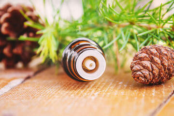 Fir tree essential oil in small bottles. Selective focus