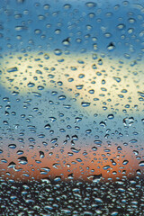 drops of rain water on the glass window