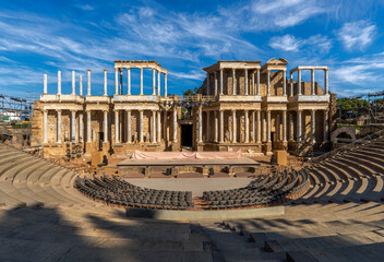 Roman Theater of Mérida with the scaffolding, spotlights, stage and chairs placed under the stands...