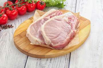 Raw pork t-bone steak for grill