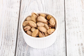 Salted tasty pistachio nuts heap