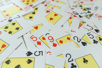 field of  bunch of poker playing cards as background