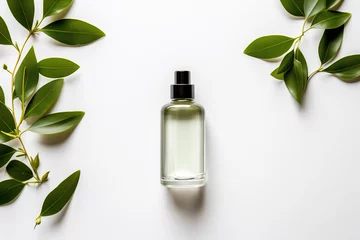 Fotobehang Natural cosmetic product oil or essence in a bottle with a dropper, with fresh green leaves, top view. Concept of beauty, skin, hair or body care  © ALL YOU NEED studio