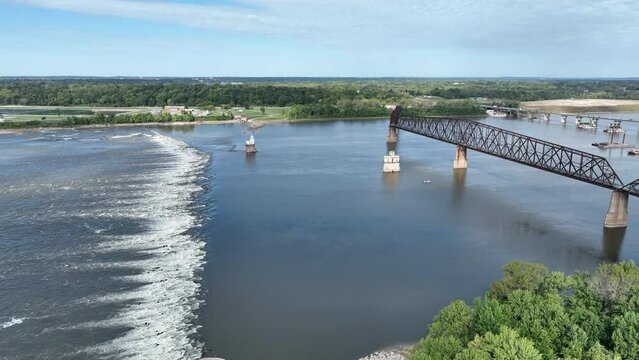 Chain of Rocks on the Mississippi River above St Louis with the Low Water Dam, water towers, old historic bridge and the new bridge with construction work