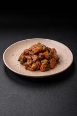 Delicious vegetable stew of potatoes, beef meat, mushrooms, carrots, salt, spices and herbs