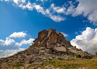 View of a lonely rock on a sunny summer day. Gorny Altai, Russia