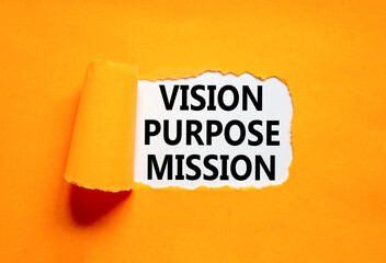 Vision purpose mission symbol. Concept word Vision Purpose Mission on beautiful white paper. Beautiful orange table orange background. Business motivational vision purpose mission concept. Copy space.