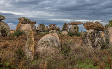 Modern Menhir exposure done near Castelo Branco in Portugal in a very cloudy day. With the menhir we began our path as designers and builders of landscapes.