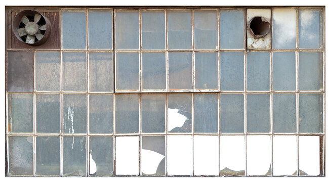 A window in an old workshop with damaged panes. Isolated background.