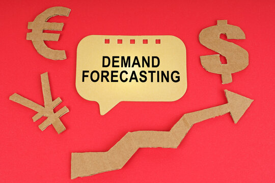 On the red surface there are money symbols, an arrow and a sign with the inscription - Demand Forecasting