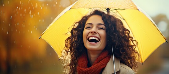 Joyful girl with umbrella in autumn rain bad weather - obrazy, fototapety, plakaty