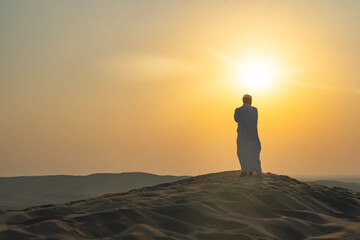 Fototapeta na wymiar People at Sunset in the Doha Desert Photo, Doha Qatar