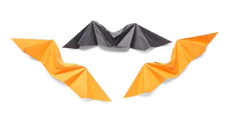 Different origami bats on white background