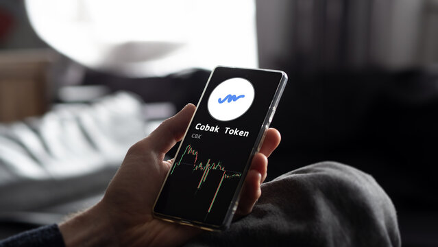 October 26th 2023. An investor analyzing the price of Cobak Token CBK, the crypto $CBK broke out above the limit, CBK climbs above the price.