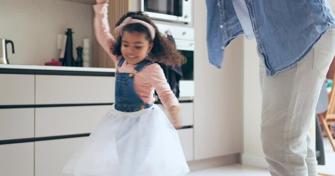 Parent, dancing and little girl twirling in kitchen of princess with cute dress at home. Happy child, dancer or ballerina kid in twirl or spin around for bonding, celebration or fun together at house