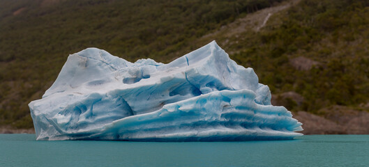 Big iceberg floating in a lake