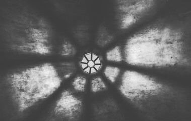 light from the lamp and the shadows in the mysterious corridor in old dungeon