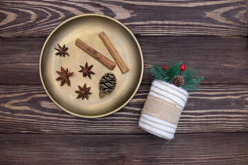Copper plate mockup with Christmas and New Year decoration on wooden table