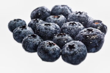 Closeup of fresh blueberries isolated on a white background