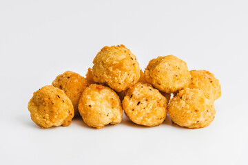 Chicken Breaded Fillet.Fast food. Breaded Chicken Inner Fillet on a White Background,Chicken Breaded Raw Meat. Fast cooking. Breaded chicken nuggets. Homemade food at home.