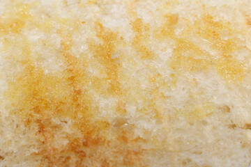 close up of bread. bread with butter. bread and butter. bread texture. food details.