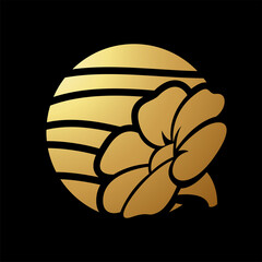 Gold Abstract Icon of a Flower Over a Striped Circle