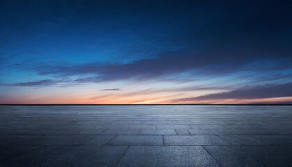 black asphalt floor background and dark blue night sky sunset horizon with subtle clouds - obrazy, fototapety, plakaty