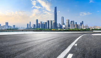 race track road and city skyline with modern buildings scenery in guangzhou guangdong province china panoramic view - obrazy, fototapety, plakaty