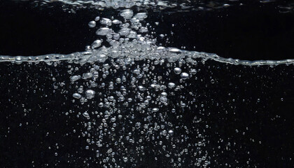 soda water bubbles splashing underwater against black background cola liquid texture that fizzing and floating up to surface like a explosion in under water for refreshing carbonate drink concept - obrazy, fototapety, plakaty