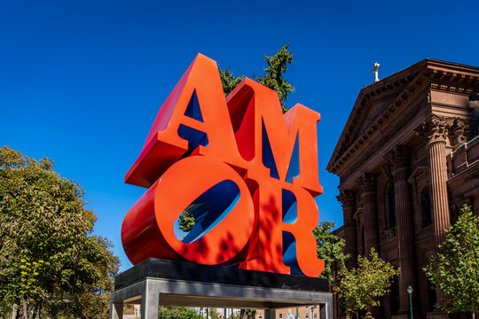 Philadelphia, PA - US - Oct 13, 2023 The Spanish-version of Robert Indiana's pop art Love design. The AMOR sculpture installed at Sister Cities Park at the Cathedral Basilica of Saints Peter and Paul.