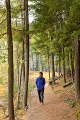 Woman taking a stroll through nature.