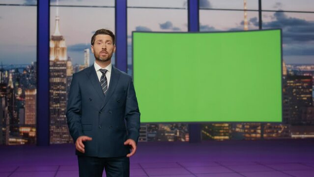 Confident newscast presenter talking daily news in tv studio with green screen.