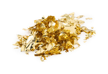 Pile of edible gold leaf on white background