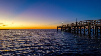Pier at sunset on Mobile bay