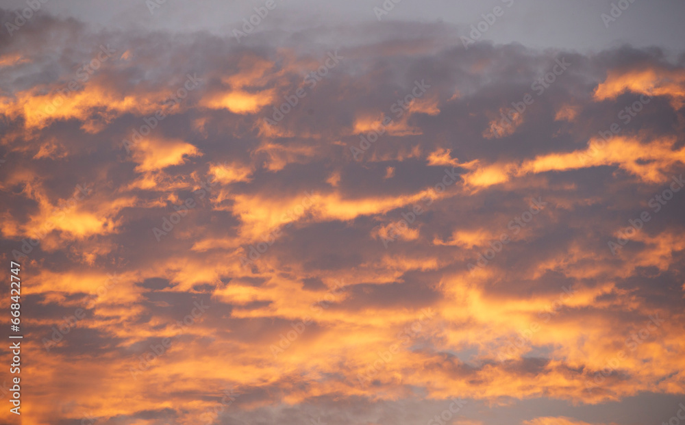 Wall mural Cloudscape, Colored Clouds at Sunset near the Ocean, Background