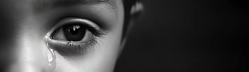 Fotobehang black and white eyes sadness of boy  © iDoPixBox