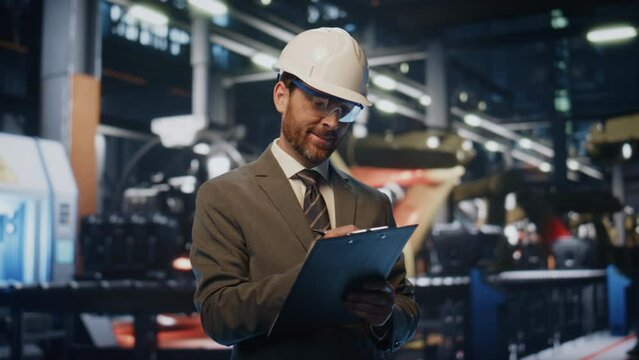 Happy factory inspector checklist making notes examining production close up.