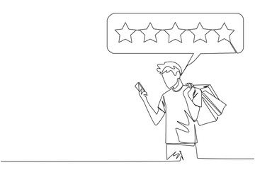 Single continuous line drawing happy smiling man holding several shopping bags. The other hand typing on the smartphone gives a 5 star review. Online shopping. One line design vector illustration