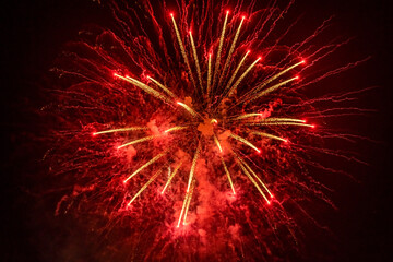 Obraz premium Beautiful red festive fireworks. Selective focus.