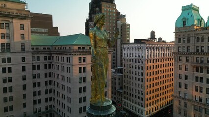 This video shows an aerial shot of Brooklyn Borough Hall at Cadman Plaza Park during the summer season.  - Powered by Adobe
