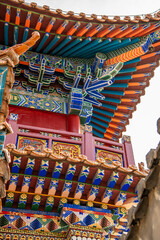 Roof decorations and architectural details at Da Zhao temple, Hohhot, China.